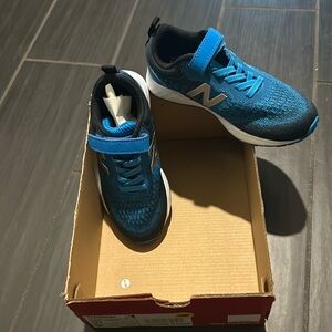 New Balance boys sneakers brand new new with tags. Size 11 in blue